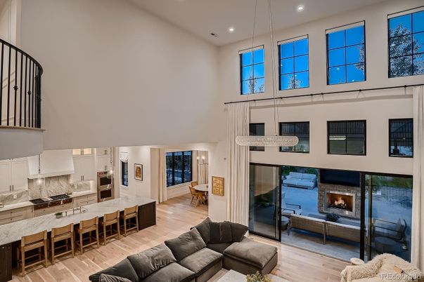 Fireplace, Interior, Kitchen, Living room, Pendant Lights, Recessed Lighting, Stainless Steel Appliances, Wood Texture Flooring