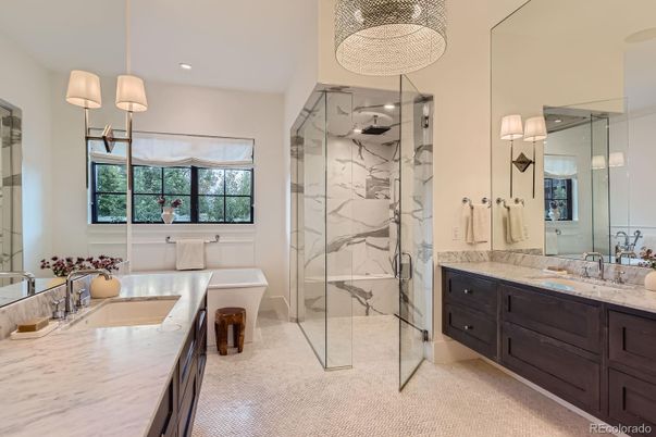 Bathroom, Dual Sink Vanities, Glass Shower, Interior, Marble Walls, Recessed Lighting