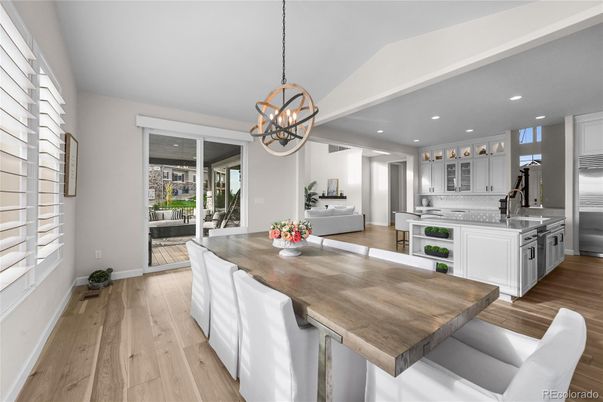 Chandelier, Dining room, Interior, Kitchen, Pendant Lights, Recessed Lighting, Stainless Steel Appliances, Wood Texture Flooring