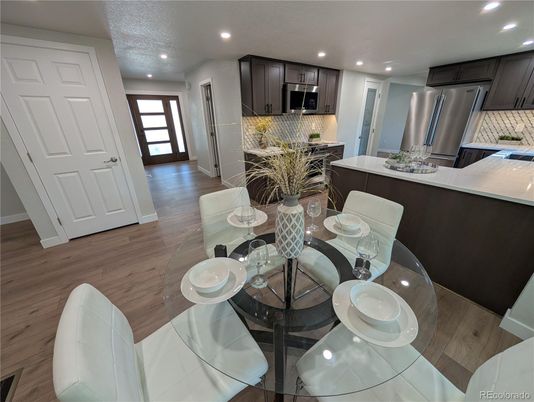 Dining room, Interior, Kitchen, Recessed Lighting, Stainless Steel Appliances, Wood Texture Flooring