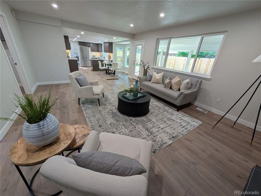 Dining room, Interior, Kitchen, Living room, Pendant Lights, Recessed Lighting, Stainless Steel Appliances, Wood Texture Flooring