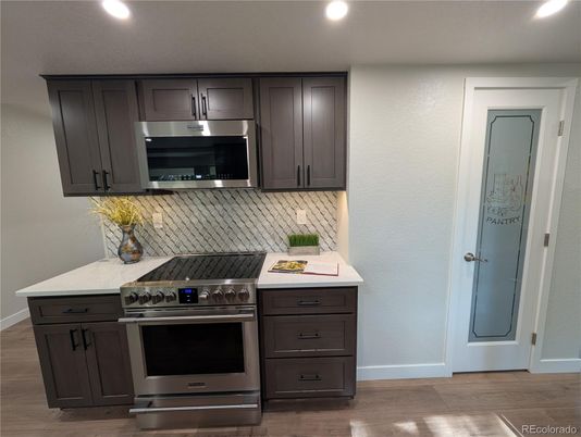 Interior, Kitchen, Recessed Lighting, Stainless Steel Appliances, Wood Texture Flooring