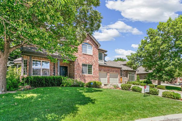 Attached, Backyard, Exterior, Facade, Brick Facade, Tudor Revival