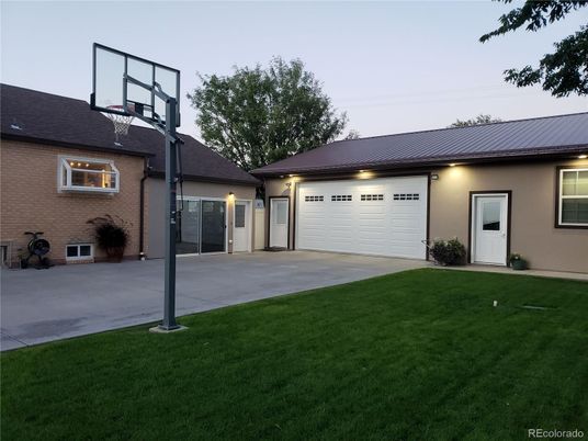 Attached, Backyard, Exterior, Facade, Brick Facade, Ranch
