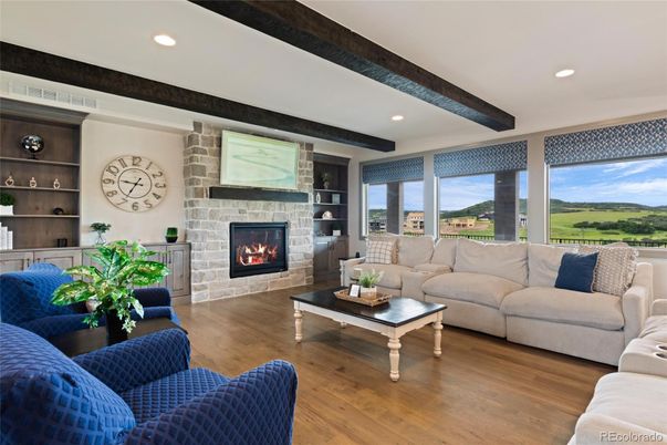 Fireplace, Interior, Living room, Recessed Lighting, Stone Walls, Wooden Beams, Wood Texture Flooring