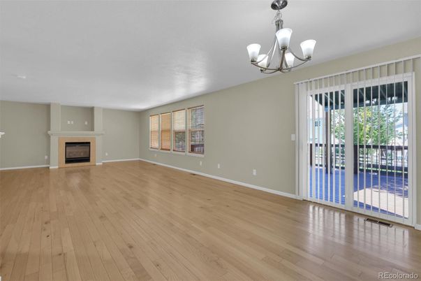 Chandelier, Empty room, Fireplace, Interior, Wood Texture Flooring
