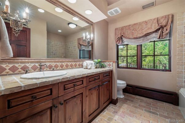 Bathroom, Dual Sink Vanities, Interior, Recessed Lighting, Tile Countertops