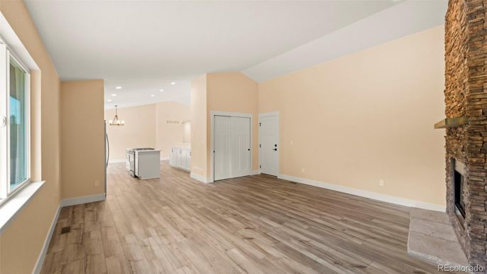 Empty room, Fireplace, Interior, Pendant Lights, Recessed Lighting, Wood Texture Flooring