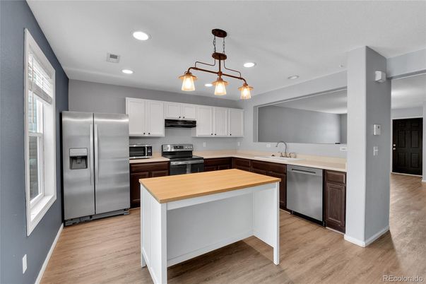 Interior, Kitchen, Pendant Lights, Recessed Lighting, Stainless Steel Appliances, Wood Texture Flooring