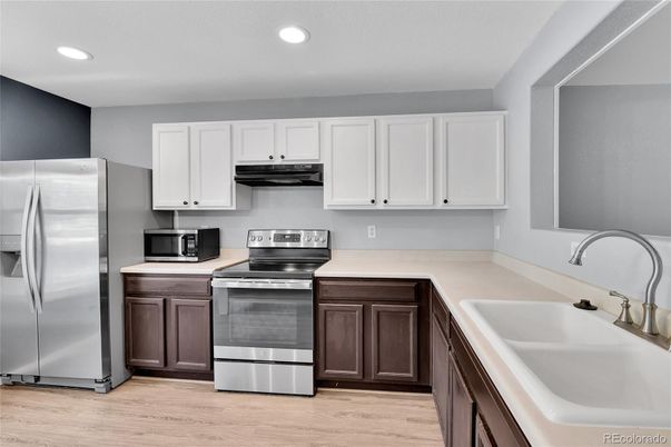 Interior, Kitchen, Recessed Lighting, Stainless Steel Appliances, Wood Texture Flooring