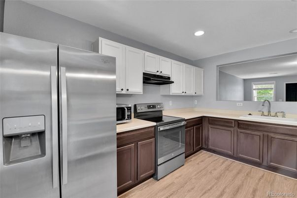 Interior, Kitchen, Recessed Lighting, Stainless Steel Appliances, Wood Texture Flooring