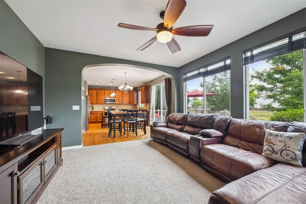 Chandelier, Dining room, Interior, Kitchen, Living room, Stainless Steel Appliances, Wood Texture Flooring