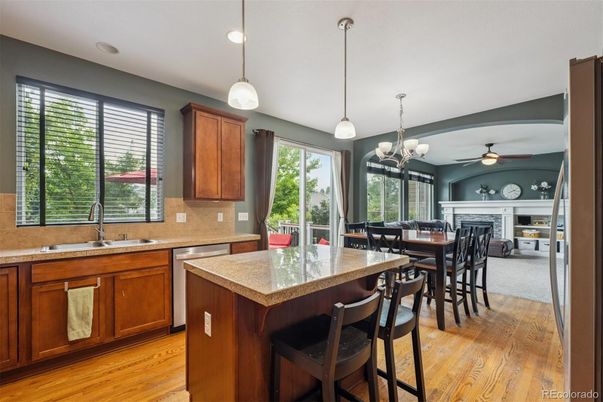 Dining room, Fireplace, Interior, Kitchen, Pendant Lights, Recessed Lighting, Wood Texture Flooring