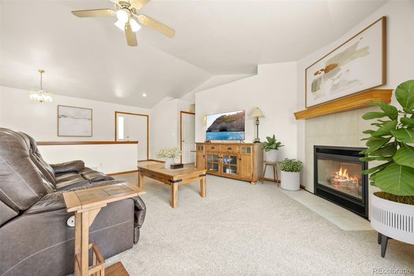 Chandelier, Fireplace, Interior, Living room