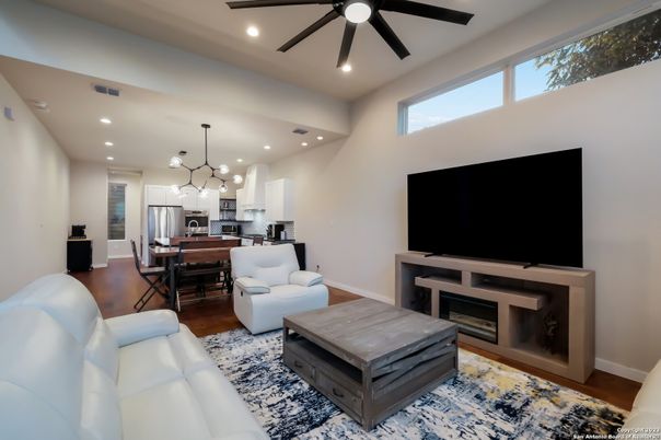 Dining room, Interior, Kitchen, Living room, Pendant Lights, Recessed Lighting, Stainless Steel Appliances, Wood Texture Flooring