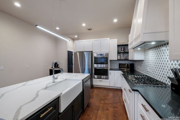 Interior, Kitchen, Recessed Lighting, Stainless Steel Appliances, Wood Texture Flooring
