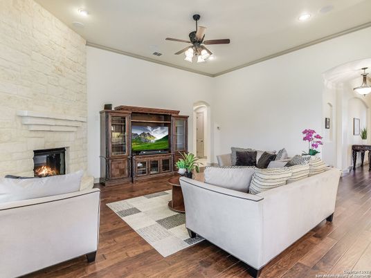 Fireplace, Interior, Living room, Pendant Lights, Recessed Lighting, Stone Walls, Wood Texture Flooring