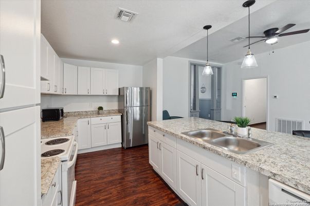 Interior, Kitchen, Pendant Lights, Recessed Lighting, Stainless Steel Appliances, Wood Texture Flooring