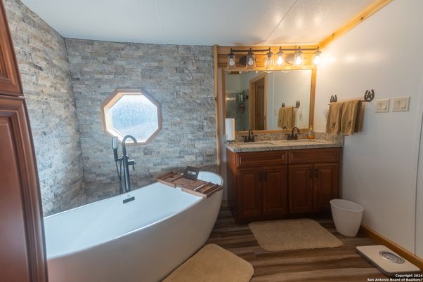 Bathroom, Dual Sink Vanities, Free Standing Baths, Interior, Wood Texture Flooring