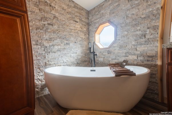 Bathroom, Free Standing Baths, Interior, Stone Walls, Wood Texture Flooring