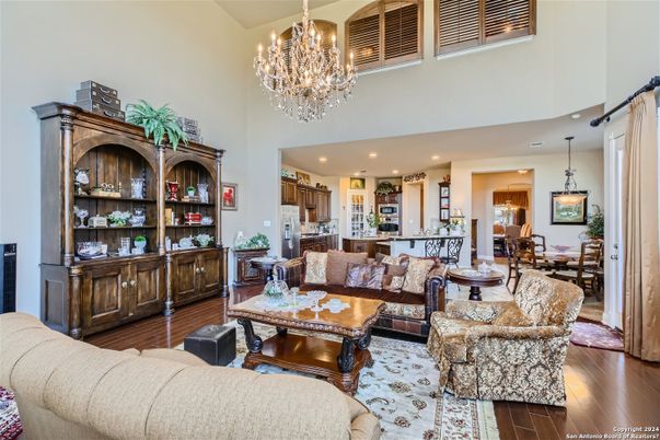 Chandelier, Dining room, Interior, Kitchen, Living room, Recessed Lighting, Wood Texture Flooring