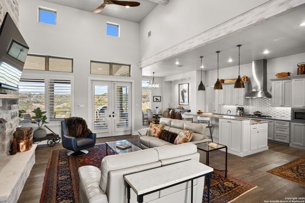 Chandelier, Dining room, Interior, Kitchen, Living room, Pendant Lights, Recessed Lighting, Wood Texture Flooring