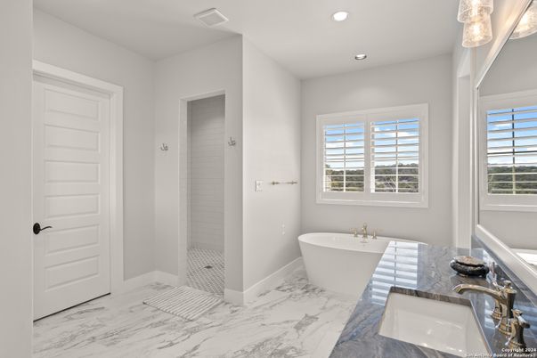 Bathroom, Dual Sink Vanities, Free Standing Baths, Interior, Marble, Recessed Lighting