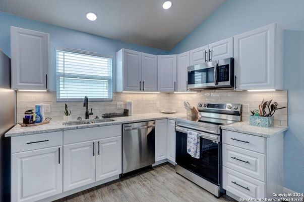 Interior, Kitchen, Recessed Lighting, Stainless Steel Appliances, Wood Texture Flooring