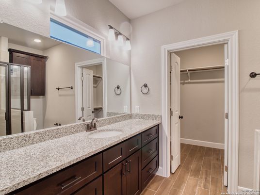 Bathroom, Dual Sink Vanities, Glass Shower, Interior, Recessed Lighting, Walk-in Closets, Wood Texture Flooring