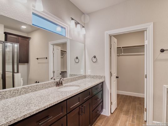 Bathroom, Dual Sink Vanities, Glass Shower, Interior, Recessed Lighting, Walk-in Closets, Wood Texture Flooring
