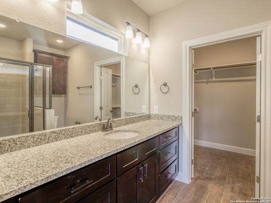 Bathroom, Dual Sink Vanities, Glass Shower, Interior, Walk-in Closets, Wood Texture Flooring