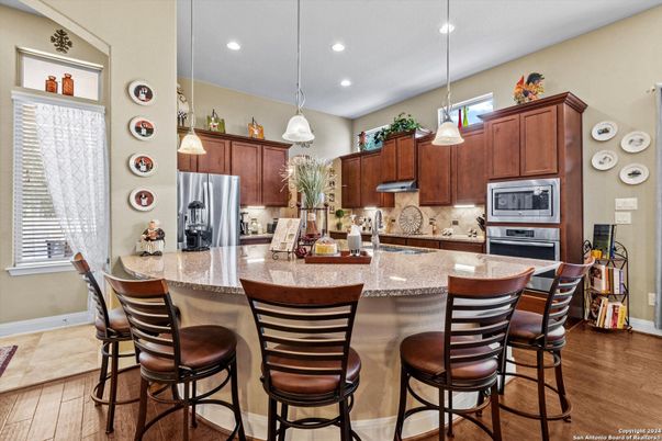 Interior, Kitchen, Pendant Lights, Recessed Lighting, Stainless Steel Appliances, Wood Texture Flooring