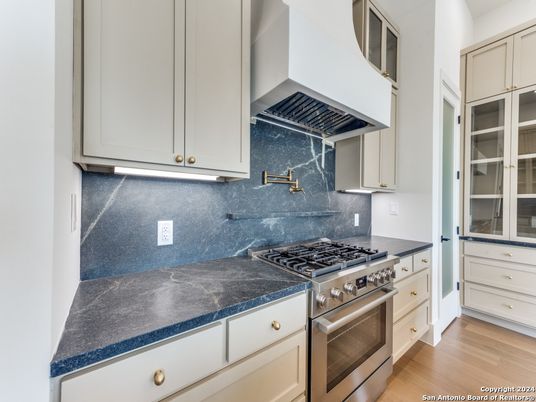 Interior, Kitchen, Marble Walls, Stainless Steel Appliances, Wood Texture Flooring