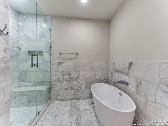 Bathroom, Free Standing Baths, Glass Shower, Interior, Marble, Marble Walls, Recessed Lighting