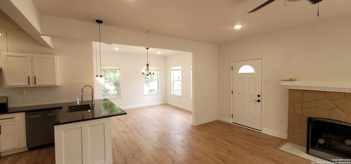 Fireplace, Interior, Kitchen, Pendant Lights, Recessed Lighting, Wood Texture Flooring