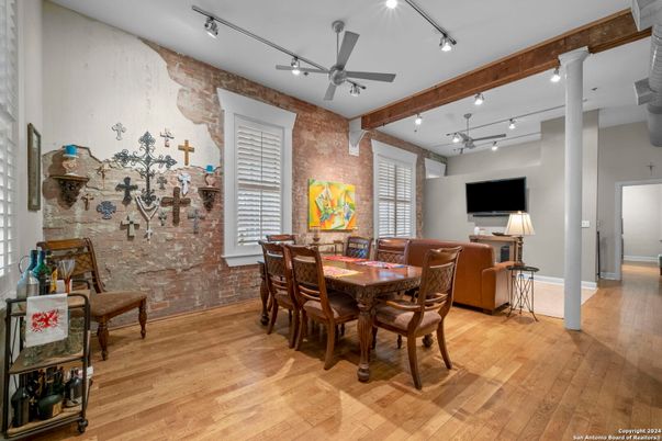 Dining room, Interior, Living room, Recessed Lighting, Stone Walls, Wood Texture Flooring