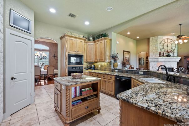 Chandelier, Dining room, Fireplace, Interior, Kitchen, Recessed Lighting