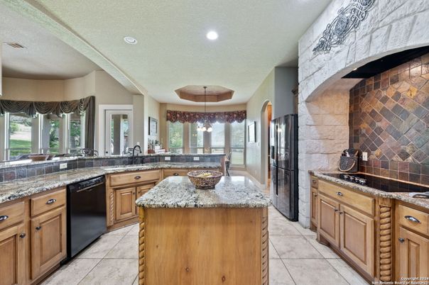 Interior, Kitchen, Pendant Lights, Recessed Lighting, Stainless Steel Appliances, Stone Walls