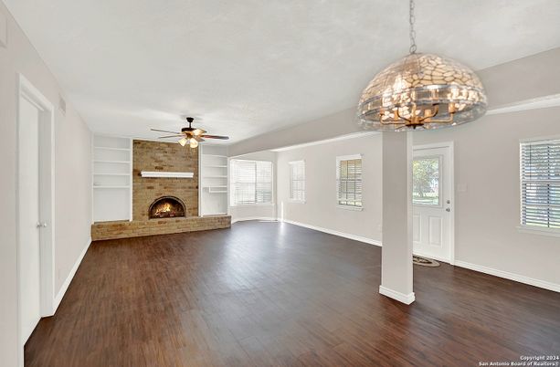 Empty room, Fireplace, Interior, Pendant Lights, Wood Texture Flooring