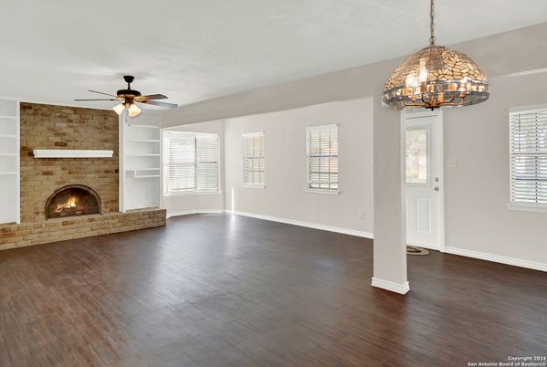 Empty room, Fireplace, Interior, Pendant Lights, Stone Walls, Wood Texture Flooring