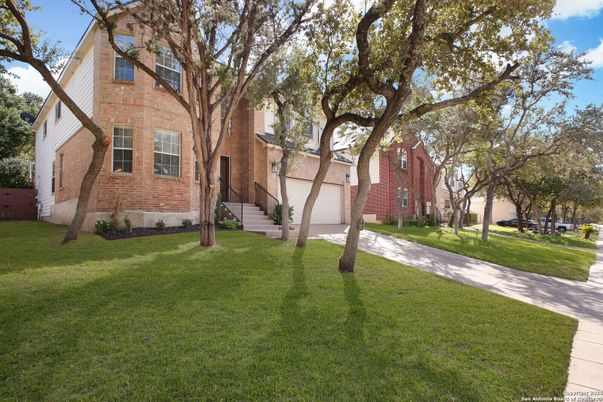 Attached, Exterior, Facade, Brick Facade, Tudor Revival