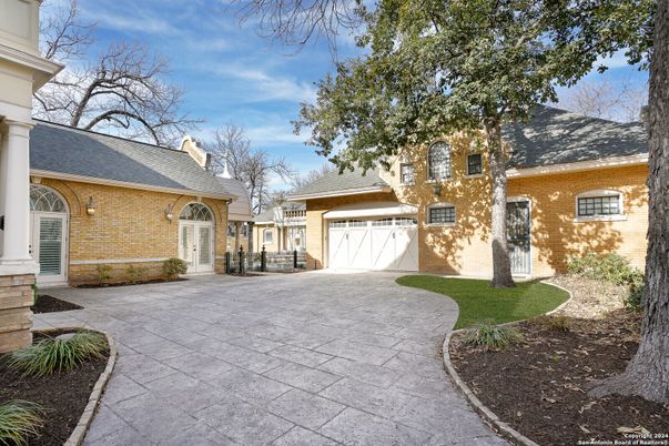 Attached, Exterior, Facade, Brick Facade, French Provincial