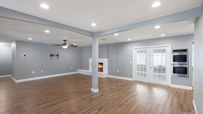 Empty room, Fireplace, Interior, Recessed Lighting, Wood Texture Flooring