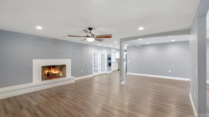 Empty room, Fireplace, Interior, Recessed Lighting, Wood Texture Flooring