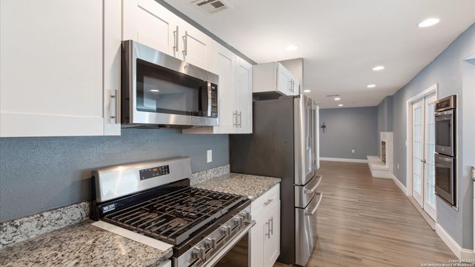 Interior, Kitchen, Recessed Lighting, Stainless Steel Appliances, Wood Texture Flooring