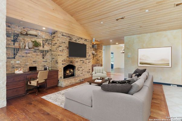 Fireplace, Home Office, Interior, Living room, Recessed Lighting, Stone Walls, Wooden Ceilings, Wood Texture Flooring