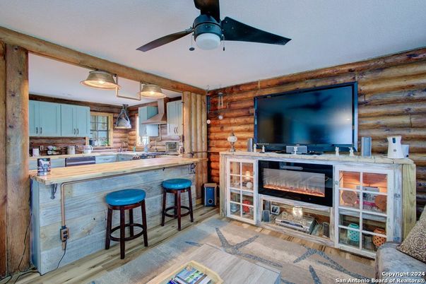 Fireplace, Interior, Kitchen, Wood Texture Flooring, Wooden Walls