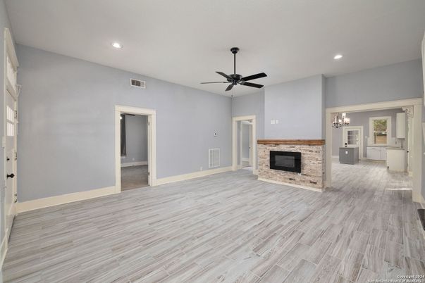Empty room, Fireplace, Interior, Recessed Lighting, Wood Texture Flooring