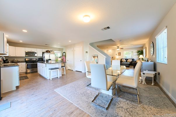 Dining room, Interior, Kitchen, Living room, Recessed Lighting, Stainless Steel Appliances, Wood Texture Flooring