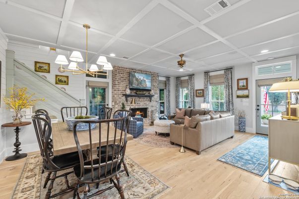 Dining room, Fireplace, Interior, Living room, Pendant Lights, Recessed Lighting, Stone Walls, Wood Texture Flooring